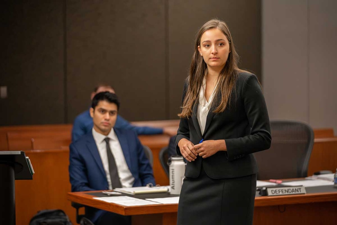 Students practicing law in a courtroom