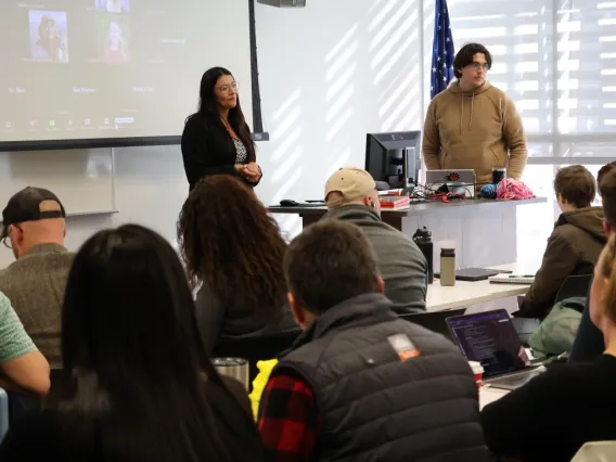 Desi Smal-Rodriguez (Northern Cheyenne Nation) leads a packed IDSov course with support from Public Health Ph.D. student William Carson (Ohkay Owingeh)