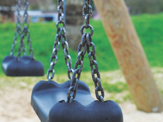 Empty swings at park