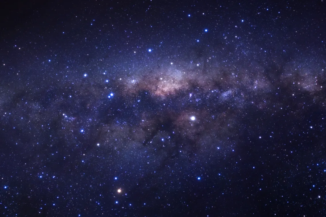 Milky way galaxy with stars and space dust in the universe, Long exposure photograph, with grain.