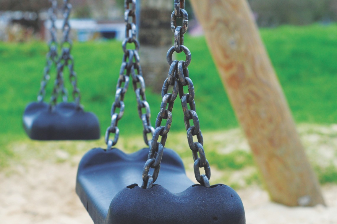 Empty swings at park