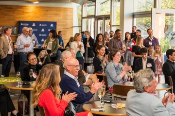 Crowd in University of Arizona Law lobby during the Beam Signing Ceremony